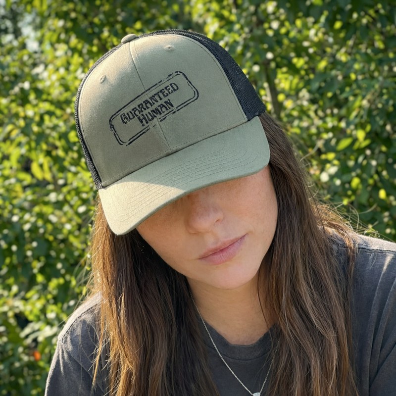 Jen, 4'11" — Staying away from the sun in her khaki trucker hat.