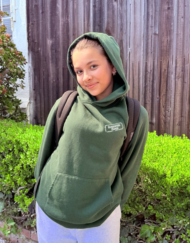 Laura, 12, 4'9" — Going to school in her comfy Forest Green hoodie — Guaranteed Human™ Stamp Women Crest Hoodie, size Women S.